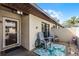 Cozy patio features an outdoor seating area, perfect for relaxing or entertaining guests at 2214 Se Sawgrass Ct, Winter Haven, FL 33884