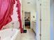 Bright bathroom featuring a tub and an access door to another room at 2218 W Gore St, Orlando, FL 32805
