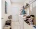 Modest laundry room with neutral-toned walls, and standard appliances at 2218 W Gore St, Orlando, FL 32805