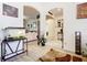 Open living area with tile flooring, arched doorways, and a view to the Entryway at 2218 W Gore St, Orlando, FL 32805