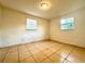 Bright bedroom with tile floors and window at 222 Haynes St, Daytona Beach, FL 32114