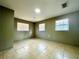 Empty bedroom with tile floors and neutral-colored walls at 222 Haynes St, Daytona Beach, FL 32114
