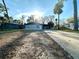 House exterior with driveway and palm trees at 222 Haynes St, Daytona Beach, FL 32114