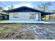 Newly renovated home with blue accents and a carport at 222 Haynes St, Daytona Beach, FL 32114