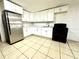 Newly remodeled kitchen, featuring white cabinets and stainless steel appliances at 222 Haynes St, Daytona Beach, FL 32114