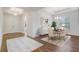 Spacious dining room with modern decor, hardwood floors, and lots of natural light at 25974 High Hampton Cir, Sorrento, FL 32776