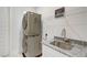 Clean and functional laundry room with modern washer and dryer at 25974 High Hampton Cir, Sorrento, FL 32776