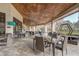 Spacious outdoor seating area featuring multiple tables and chairs at 25974 High Hampton Cir, Sorrento, FL 32776