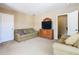 Spacious bonus room with seating area and plenty of room to relax at 2632 Sand Hill Point Cir, Davenport, FL 33837