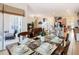 Spacious dining area seamlessly connects to the living room and kitchen at 2632 Sand Hill Point Cir, Davenport, FL 33837