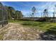Backyard showing lush grass leading up to lake at 2639 Janet Ct, Deltona, FL 32738