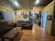 Inviting living room with comfortable seating and an open floor plan to the kitchen at 310 Lake Ave, Dundee, FL 33838