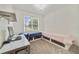 Bedroom featuring two built in beds, carpet and a window that brings in natural light at 3966 Avalon Park West Blvd, Orlando, FL 32828