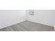 Carpeted bedroom features neutral walls and bright natural light at 4027 Copperleaf Ln, Poinciana, FL 34759