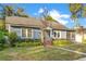 View of the exterior of the house, landscaping, windows, and architectural details at 404 W 19Th St, Sanford, FL 32771