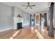 Living area features fireplace, hardwood floors, and natural light at 404 W 19Th St, Sanford, FL 32771