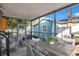Entertain on this screened porch with ample seating, table and decorative accents at 404 W 19Th St, Sanford, FL 32771