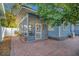 Cozy screened-in porch with brick flooring and natural light, perfect for relaxing outdoors at 404 W 19Th St, Sanford, FL 32771