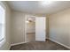 Comfortable bedroom with soft carpet and a neutral color scheme, offering a cozy retreat at 424 S Observatory Dr, Orlando, FL 32835