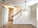 Bright dining room adjacent to stairs and entryway at 4636 Southlawn Ave, Orlando, FL 32811