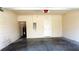 Attached garage with door to house and water heater at 4636 Southlawn Ave, Orlando, FL 32811