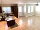Kitchen with granite countertops and dark brown cabinets at 4636 Southlawn Ave, Orlando, FL 32811