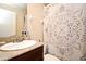 Bathroom featuring a granite counter and patterned shower curtain at 5405 Napoli Cv, Lake Mary, FL 32746