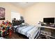 Bedroom with laminate floors and a desk at 5405 Napoli Cv, Lake Mary, FL 32746