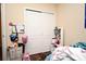 Bedroom with laminate floors and a closet at 5405 Napoli Cv, Lake Mary, FL 32746