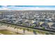 Expansive aerial view of a residential community with well-maintained homes and streets at 651 Tortugas St, Haines City, FL 33844