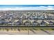 Discover modern living in this vibrant community; aerial shot highlights tidy streets and well-maintained homes at 651 Tortugas St, Haines City, FL 33844