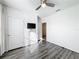 Clean bedroom design featuring wood floors, white trim and neutral walls at 651 Tortugas St, Haines City, FL 33844