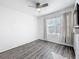 Bright bedroom with hardwood floors and a large window offering natural light at 651 Tortugas St, Haines City, FL 33844