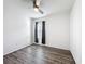 Inviting bedroom with wood flooring, window, and a minimalist style at 651 Tortugas St, Haines City, FL 33844