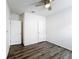 Comfortable bedroom featuring wood flooring and ample closet space at 651 Tortugas St, Haines City, FL 33844