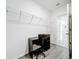 Walk-in closet with overhead shelving and a dedicated desk and chair provides ample storage at 651 Tortugas St, Haines City, FL 33844