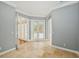 Hallway with travertine floors and view of a pool at 6533 Cartmel Ln, Windermere, FL 34786