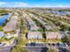 Lovely townhome community with lake views, lush landscaping, and convenient parking for residents and guests at 10421 Manderley Way # 268, Orlando, FL 32829