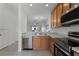 Modern kitchen with stainless steel appliances and plenty of counter space at 10421 Manderley Way # 268, Orlando, FL 32829