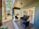 Cozy outdoor patio with stylish furniture, providing a relaxing extension of the living space at 10421 Manderley Way # 268, Orlando, FL 32829