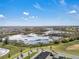 Scenic aerial view of neighborhood with green trees and community lakes at 12043 Holystone St, Winter Garden, FL 34787