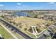 Aerial view of a lakefront park in the community featuring sports and recreational amenities at 12043 Holystone St, Winter Garden, FL 34787