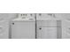 The laundry room features a white Whirlpool washer and dryer at 12043 Holystone St, Winter Garden, FL 34787