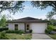 Charming single story home with a classic design, neutral tones, and well-maintained landscaping at 1245 13Th St, Orange City, FL 32763