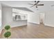Bright, open living area next to the modern kitchen, creating a seamless entertaining space at 1245 13Th St, Orange City, FL 32763