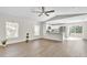 Bright and open living area connected to a modern kitchen and sliding glass doors for natural light at 1245 13Th St, Orange City, FL 32763