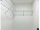 Walk-in closet with L-shaped wire shelving and painted walls at 1245 13Th St, Orange City, FL 32763