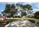 Spacious backyard with pavers and mature trees at 12826 Forestedge Cir, Orlando, FL 32828