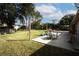 Large backyard with patio and plenty of grass space at 12826 Forestedge Cir, Orlando, FL 32828