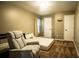 Bedroom with recliner and a queen bed at 12826 Forestedge Cir, Orlando, FL 32828